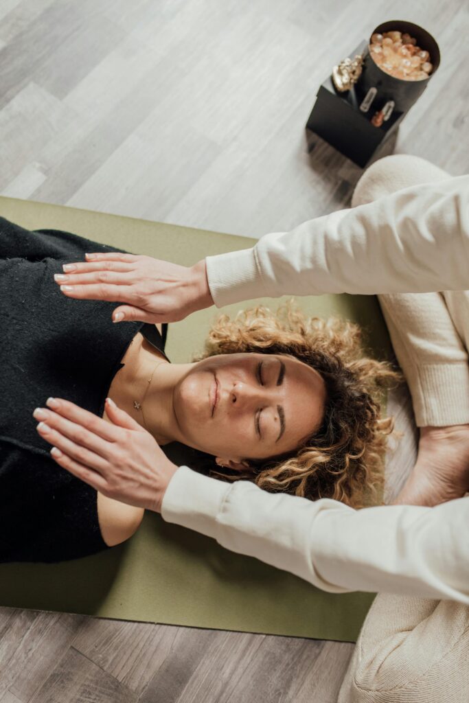 Calm woman in a cozy setting symbolizing emotional wellness and supportive care